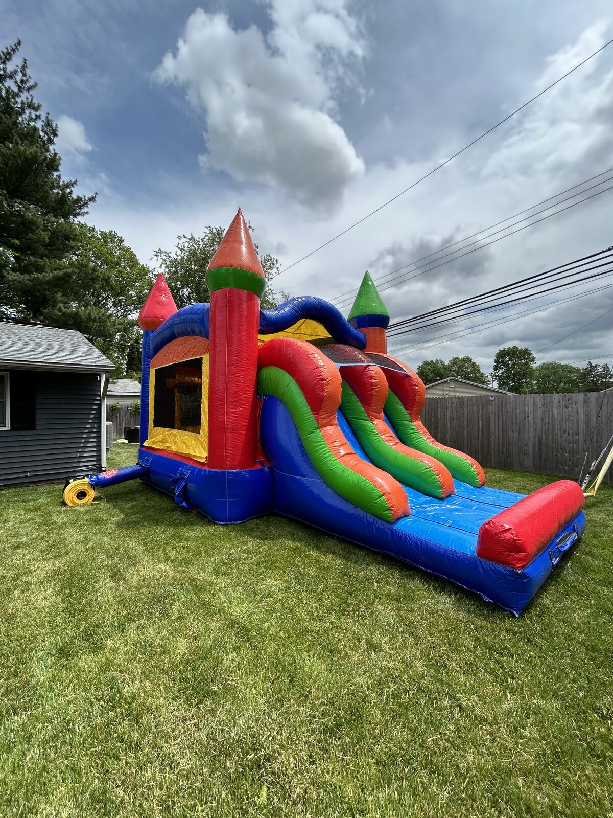 Dual Lane Combo bounce house with slide rental